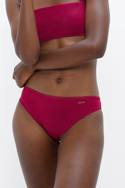 Brisbane - Bottom - Red Coral at Kamakhyaa by 1 People. This item is Bikini, Bottoms, Econyl, Elastane, Made from Natural Materials, Nylon, Pink, Recycled Brass