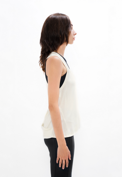 Brussels - Sports Tank Top - Powder at Kamakhyaa by 1 People. This item is Elastane, Made from Natural Materials, PYRATEX, Seacell, Seaweed Fibre, Tank Tops, Tencel, Tops, White