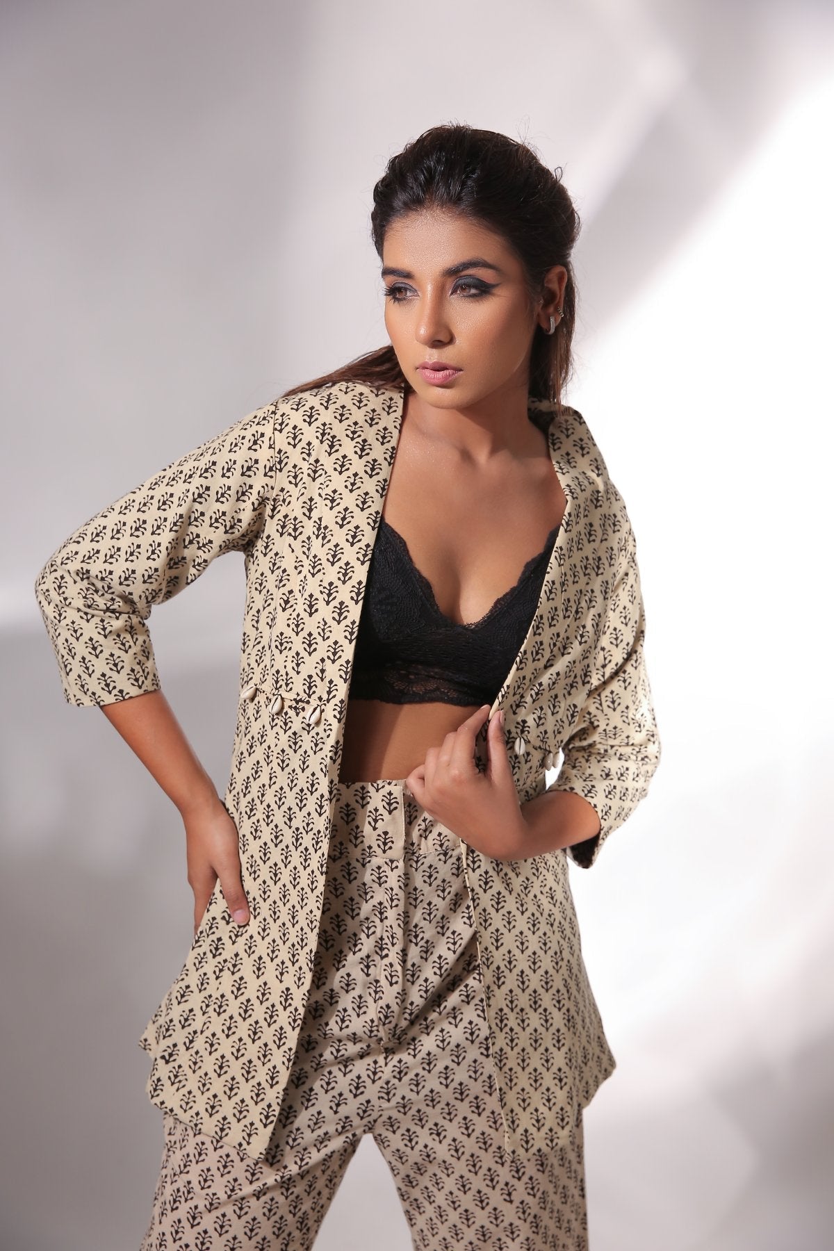 Beige Block Print Blazer And Pant Set at Kamakhyaa by Keva. This item is Beige, Black, Block Prints, Co-ord Sets, Cotton, Natural, Office, Office Wear Co-ords, Printed Selfsame, Relaxed Fit, Resort Wear, Womenswear, Zima