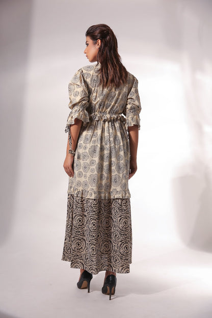 Beige Block Printed Maxi Dress at Kamakhyaa by Keva. This item is Beige, Black, Block Prints, Cotton, For Anniversary, For Daughter, Kurtas, Maxi Dresses, Natural, Relaxed Fit, Resort Wear, Tiered Dresses, Womenswear, Zima