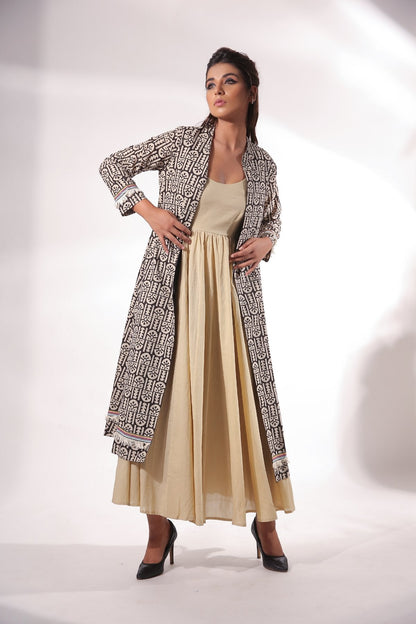 Beige Maxi Dress With Cape at Kamakhyaa by Keva. This item is Beige, Black, Block Prints, Cape, Co-ord Sets, Cotton, Dress Sets, For Daughter, For Mother, For Mother W, Maxi Dresses, Natural, Relaxed Fit, Resort Wear, Womenswear, Zima