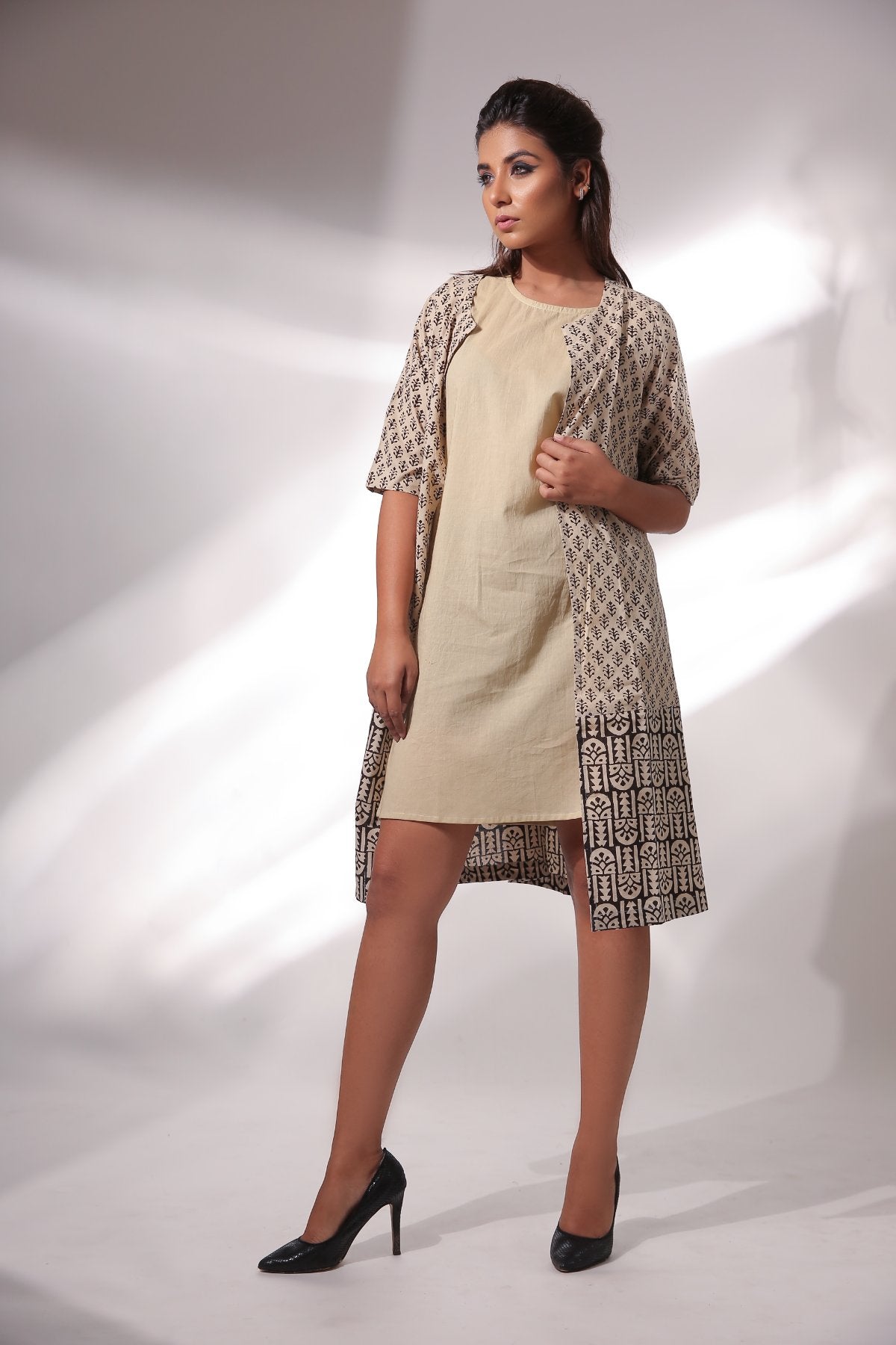 Beige Sleeveless Dress With Cape at Kamakhyaa by Keva. This item is Beige, Black, Block Prints, Cape, Co-ord Sets, Cotton, Dress Sets, For Mother, For Mother W, Natural, Relaxed Fit, Resort Wear, Womenswear, Zima