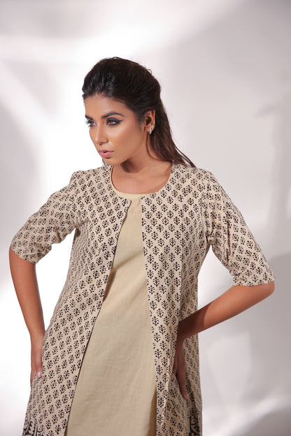 Beige Sleeveless Dress With Cape at Kamakhyaa by Keva. This item is Beige, Black, Block Prints, Cape, Co-ord Sets, Cotton, Dress Sets, For Mother, For Mother W, Natural, Relaxed Fit, Resort Wear, Womenswear, Zima