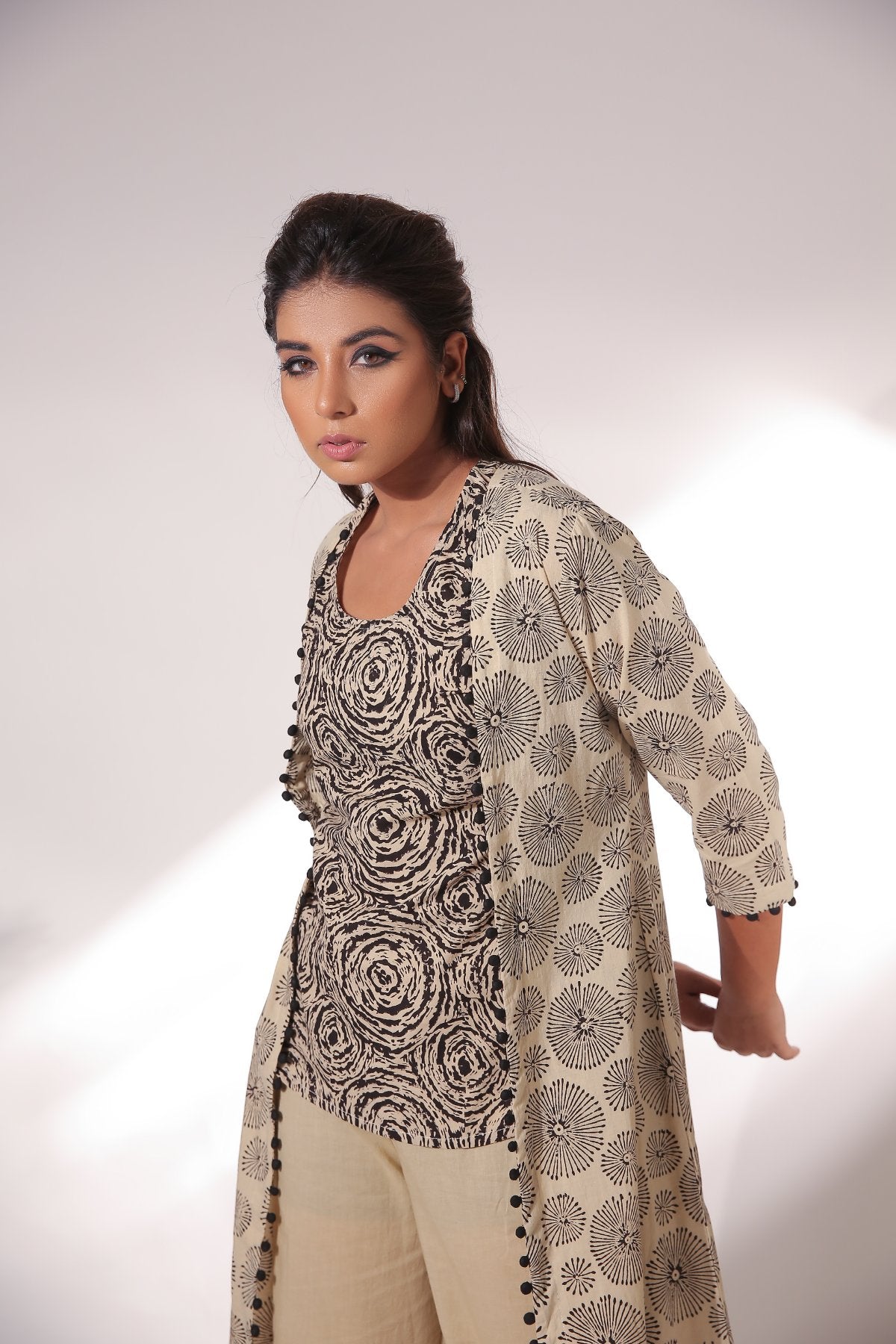 Beige Sleeveless Top With Pant & Cape at Kamakhyaa by Keva. This item is Beige, Black, Block Prints, Co-ord Sets, Cotton, Natural, Office, Office Wear Co-ords, Relaxed Fit, Resort Wear, Womenswear, Zima