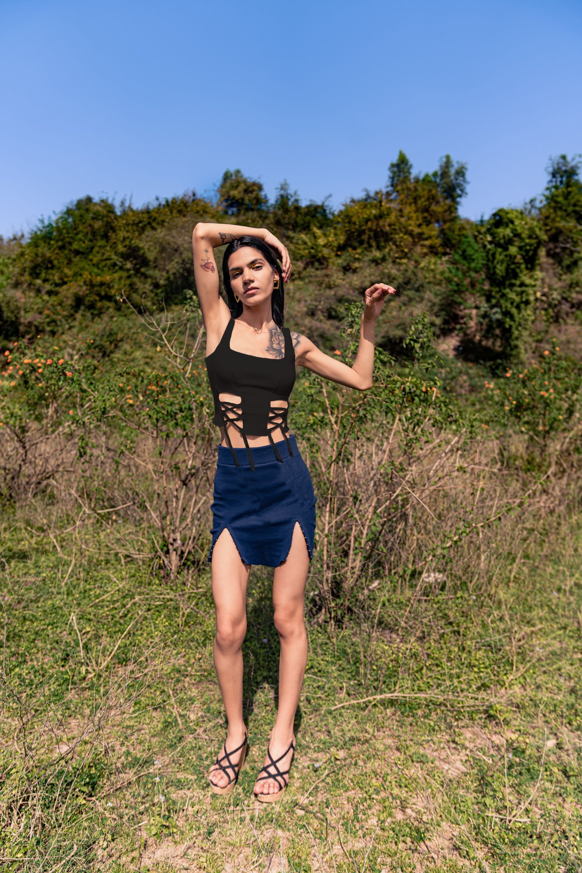 Black Solid Sleeveless Top at Kamakhyaa by Meko Studio. This item is Black, Cotton, Deadstock Fabrics, Fusion Wear, July Sale, July Sale 2023, Sleeveless Tops, Slim Fit, Solids, Spaghettis, Tops, Verao SS-22/23, Womenswear