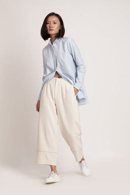 Blue Beju Pants at Kamakhyaa by Itya. This item is Hand Spun Cotton, Handwoven cotton, Natural, Off-white, Office Wear, Pants, Pastel Perfect, Pastel Perfect by Itya, Plant Dye, Relaxed Fit, Solids, SS22, Womenswear