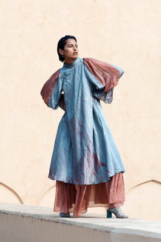 Blue Layered Silk Maxi Dress at Kamakhyaa by The Loom Art. This item is Between the Lines, Blue, Handwoven, July Sale, July Sale 2023, Maxi Dresses, Natural, Ombre & Dyes, Party Wear, Regular Fit, Silk, Womenswear