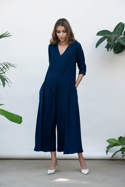 Blue Solid Jumpsuit at Kamakhyaa by Kanelle. This item is Best Selling, Blue, Bold is beautiful, Casual Wear, July Sale, Jumpsuits, Natural with azo dyes, Relaxed Fit, Solids, Viscose, Womenswear