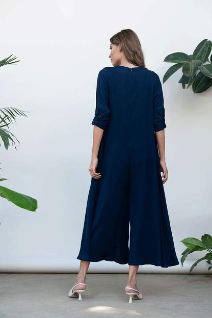 Blue Solid Jumpsuit at Kamakhyaa by Kanelle. This item is Best Selling, Blue, Bold is beautiful, Casual Wear, July Sale, Jumpsuits, Natural with azo dyes, Relaxed Fit, Solids, Viscose, Womenswear