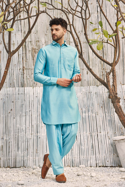 Chanderi Pathani with Salwar - Set of 2 - Blue at Kamakhyaa by Charkhee. This item is Blue, Chanderi, Cotton, Cotton Satin, Festive Wear, Kurta Salwar Sets, Mens Co-ords, Menswear, Natural, Regular Fit, Shores 23, Solids