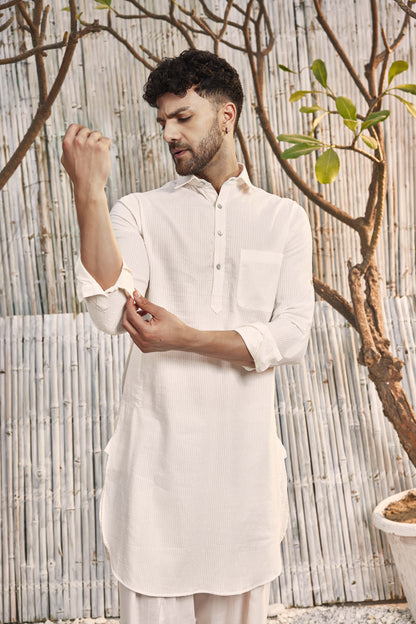 Cotton Pathani with Salwar - Set of 2 - Off-White at Kamakhyaa by Charkhee. This item is Cotton, Cotton Satin, Dobby Cotton, Festive Wear, Kurta Salwar Sets, Mens Co-ords, Menswear, Natural, Off-white, Regular Fit, Shores 23, Textured, Wedding Gifts