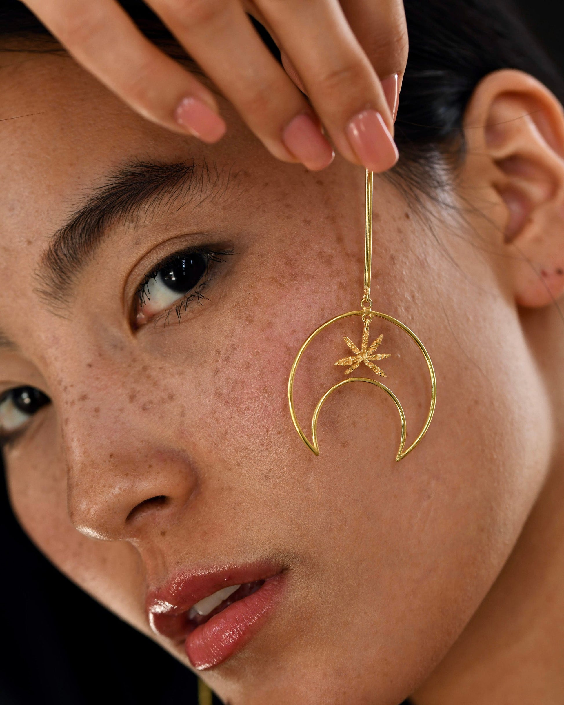 Gold Brass Linear Moon Long Earrings at Kamakhyaa by The Loom Art. This item is Brass, Cosmic Dream TLA, Fashion Jewellery, Free Size, Gold, Gold Plated, jewelry, Less than $50, Long Earrings, Natural