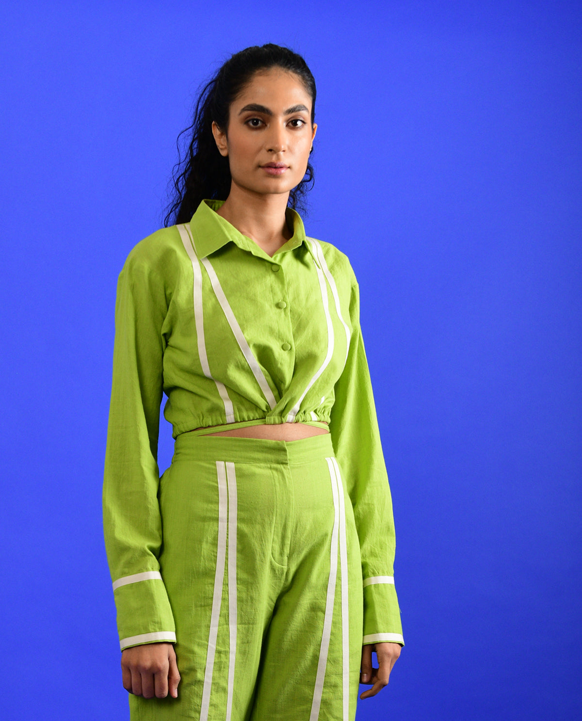 Green Tie Up Crop Top at Kamakhyaa by Rias Jaipur. This item is 100% Organic Cotton, Casual Wear, Crop Tops, Green, Handspun, Handwoven, Hue, Regular Fit, Solids, Stripes, Womenswear