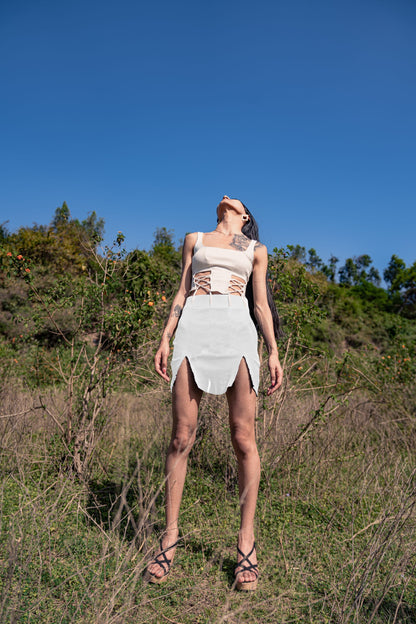 White Skirt at Kamakhyaa by Meko Studio. This item is Cotton, Deadstock Fabrics, Evening Wear, For Siblings, July Sale, July Sale 2023, Lycra, Mini Skirts, Skirts, Slim Fit, Solids, Verao SS-22/23, White, Womenswear