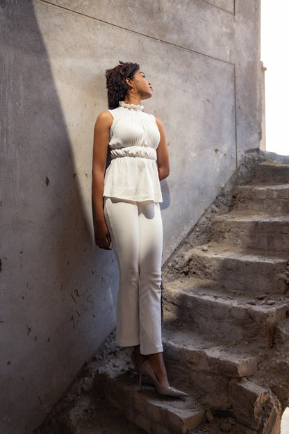 White Sleeveless Top at Kamakhyaa by Meko Studio. This item is Cotton, Deadstock Fabrics, Evening Wear, High Neck Tops, July Sale, July Sale 2023, Lycra, Relaxed Fit, Sleeveless Tops, Solids, Tops, Turtle Neck Tops, Verao SS-22/23, White, Womenswear