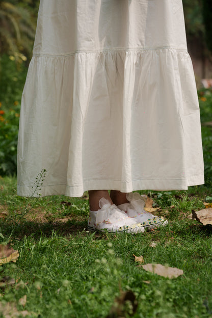 White Strap Maxi Dress at Kamakhyaa by Ahmev. This item is Casual Wear, Cotton, July Sale, July Sale 2023, Maxi Dresses, Natural, Relaxed Fit, Sleeveless Dresses, Solids, Strap Dresses, Tiered Dresses, White, Womenswear