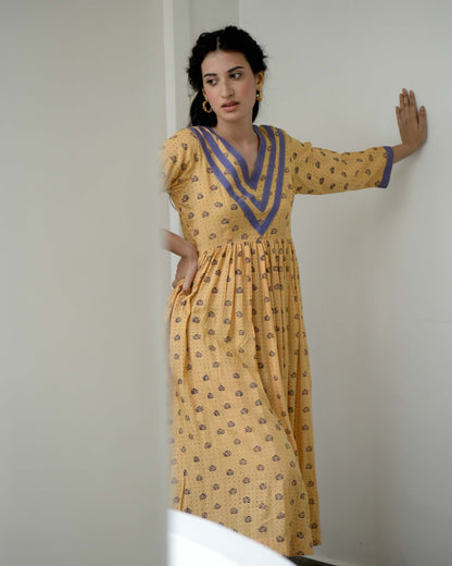 Yellow Printed Midi Dress at Kamakhyaa by Taro. This item is Evening Wear, Gulzar Taro, July Sale, July Sale 2023, Midi Dresses, Modal silk, Natural, Prints, Regular Fit, Womenswear, Yellow
