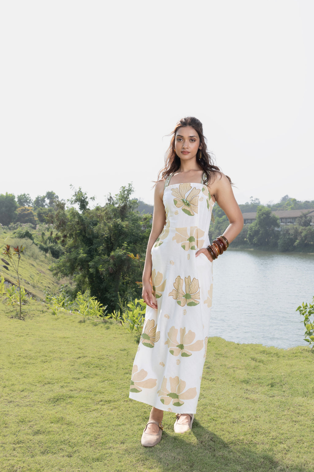 Criss-Cross Back Strappy Floral Print Midi Dress at kamakhyaa.com by Akashi Clothing. This item is Cosmos by Akashi Clothing, Internal Tags Missing, Under $150