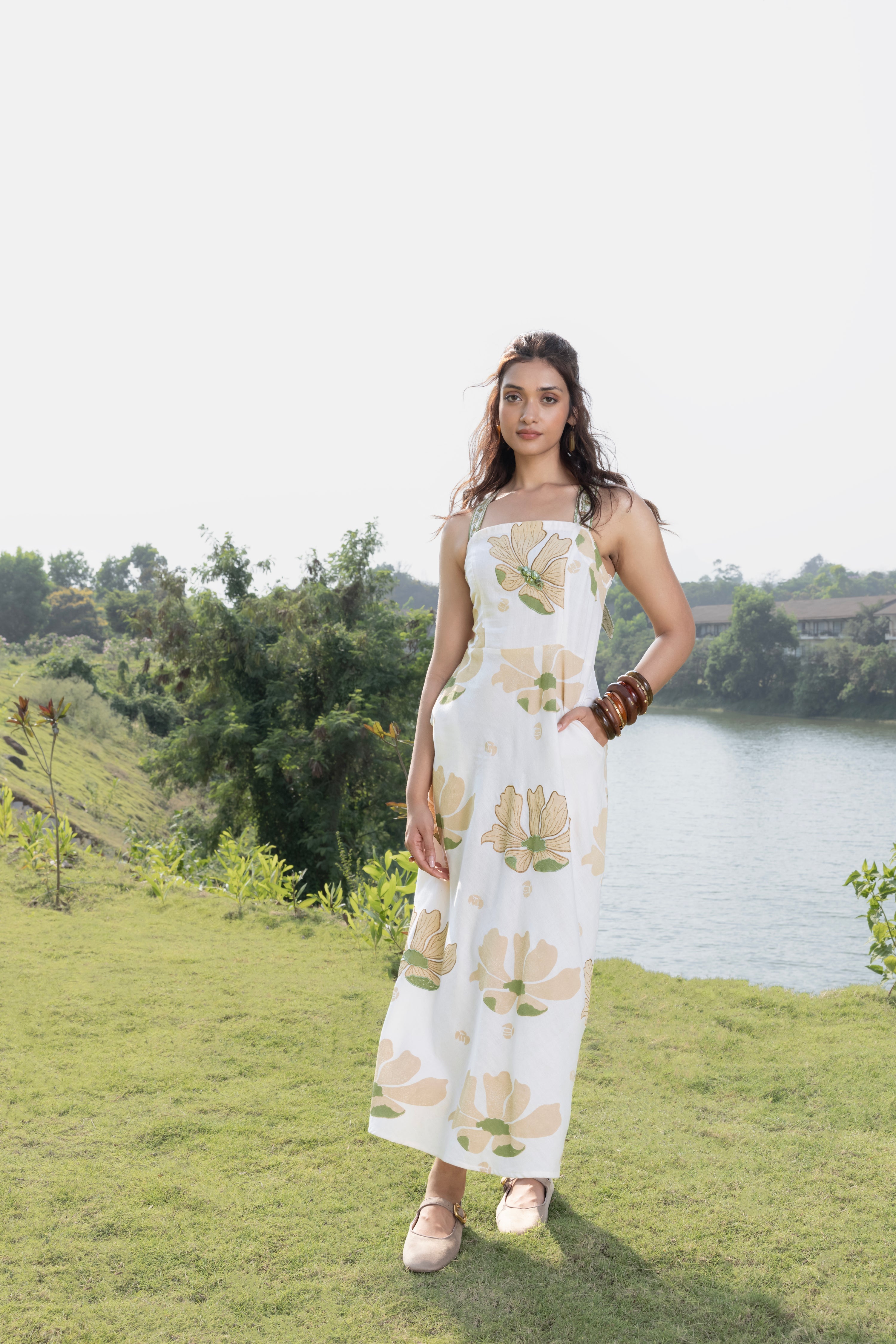Criss-Cross Back Strappy Floral Print Midi Dress at kamakhyaa.com by Akashi Clothing. This item is Cosmos by Akashi Clothing, Internal Tags Missing, Under $150