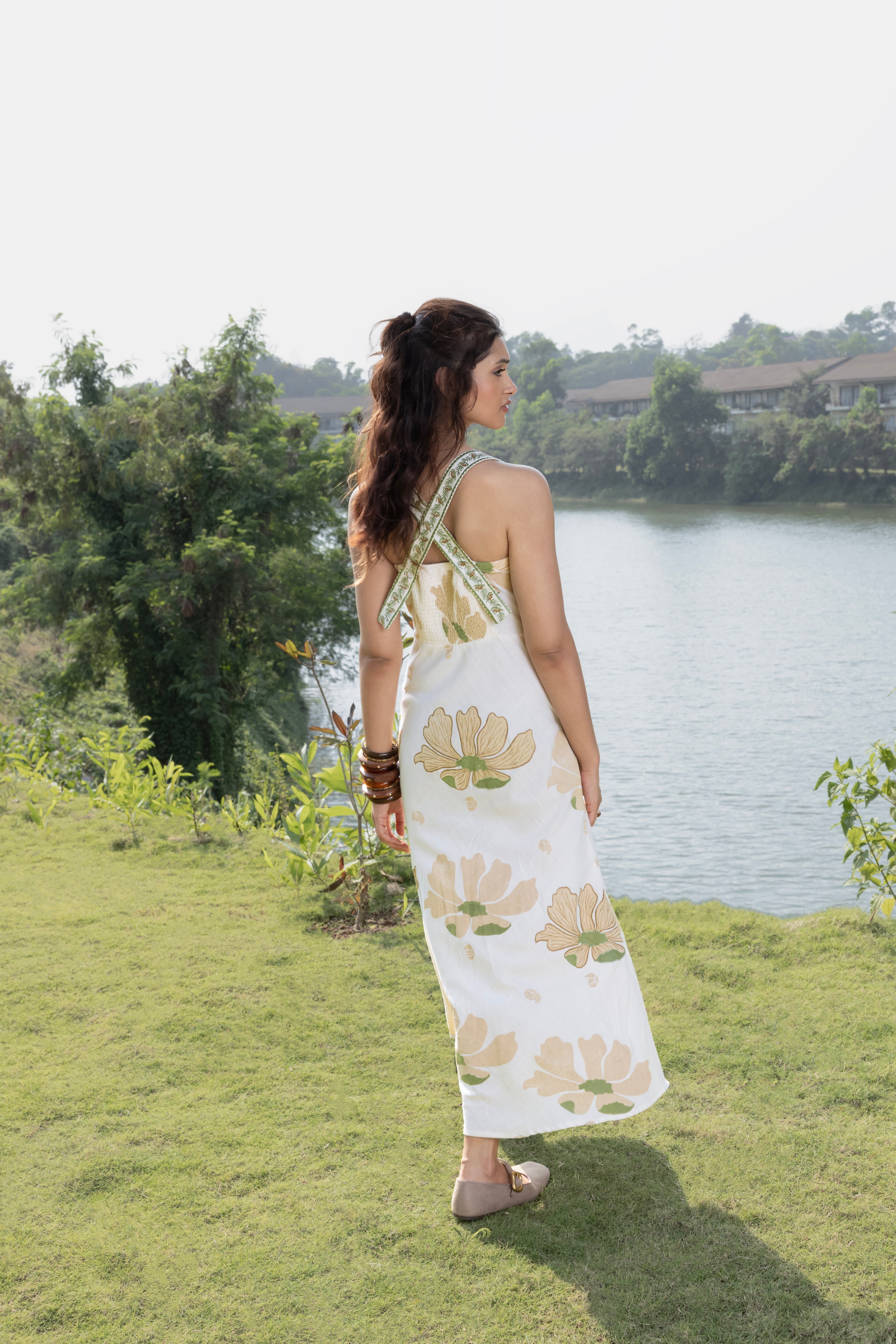 Criss-Cross Back Strappy Floral Print Midi Dress at kamakhyaa.com by Akashi Clothing. This item is Cosmos by Akashi Clothing, Internal Tags Missing, Under $150