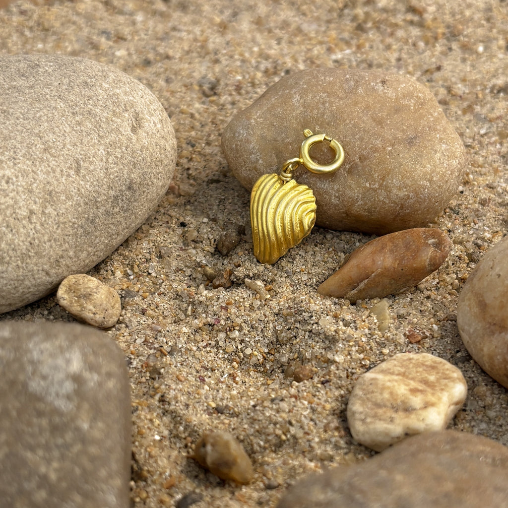 Amour Charm at Kamakhyaa by The Loom Art. This item is Charms, Charms & Pendants, Choker, Missing image, Orbis by The Loom Art, Pendants, Under $50