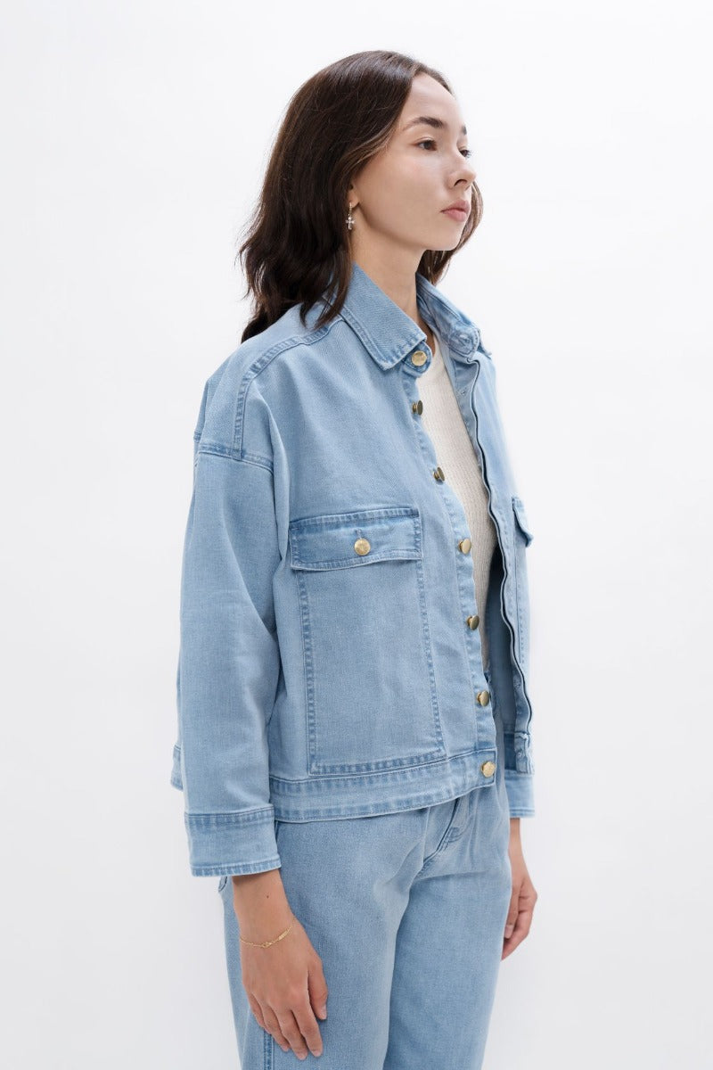 Arizona - Denim Jacket - Sky at Kamakhyaa by 1 People. This item is Denim, Denim Jacket, Elastane, Light Blue, Made from Natural Materials, Organic Cotton, Overlays, REPREVE Polyester