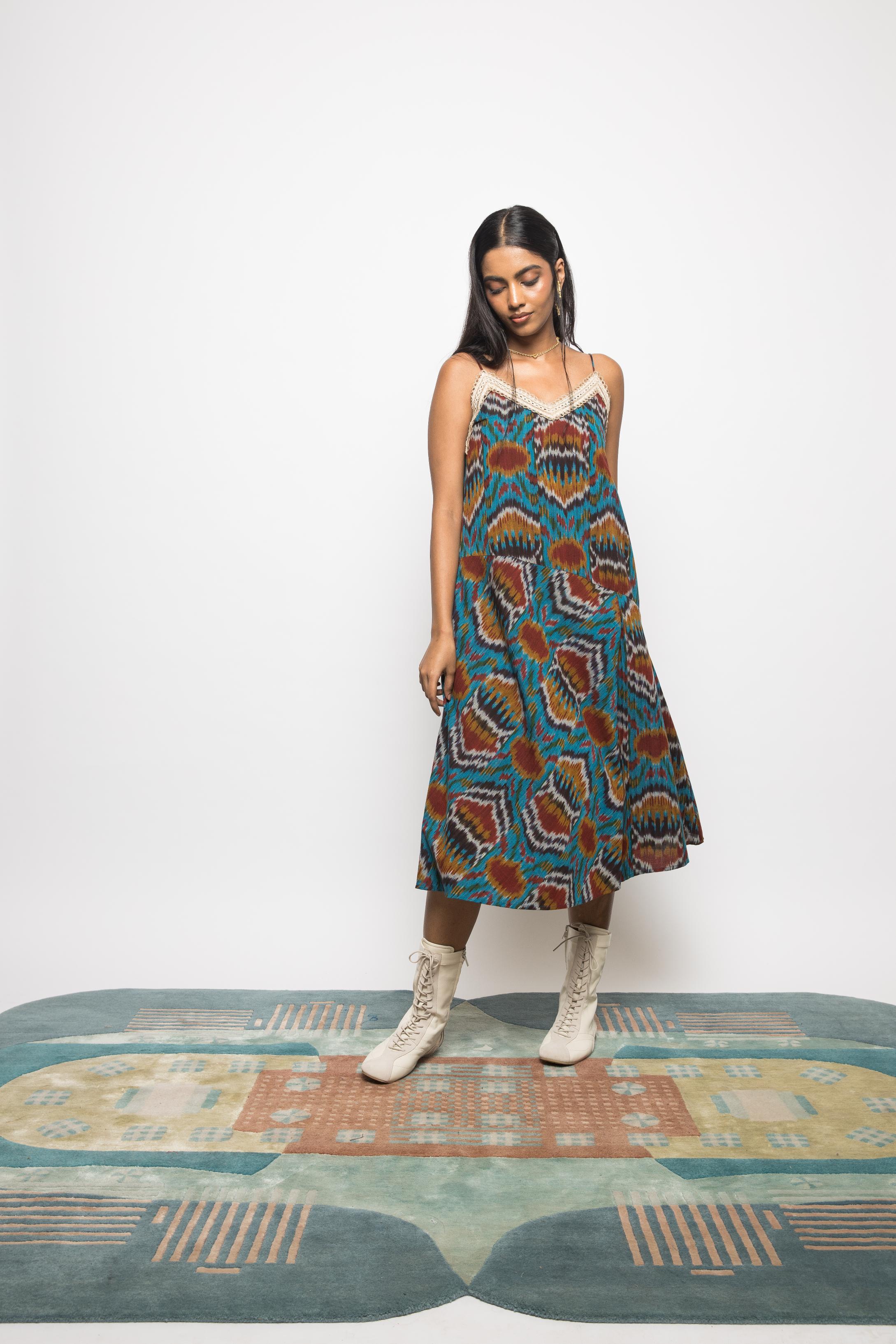 Asymmetric Waist Sling Dress at kamakhyaa.com by Anushé Pirani. This item is 100% Cotton, Beach Wear, Brunch Wear, Casual Wear, Console Collection List, Cotton, Fresh Ink by Anushe Pirani, Handwoven cotton, Ikat Prints, Regular Fit, Resort Wear, Turquoise, Vacation Wear, Womenswear