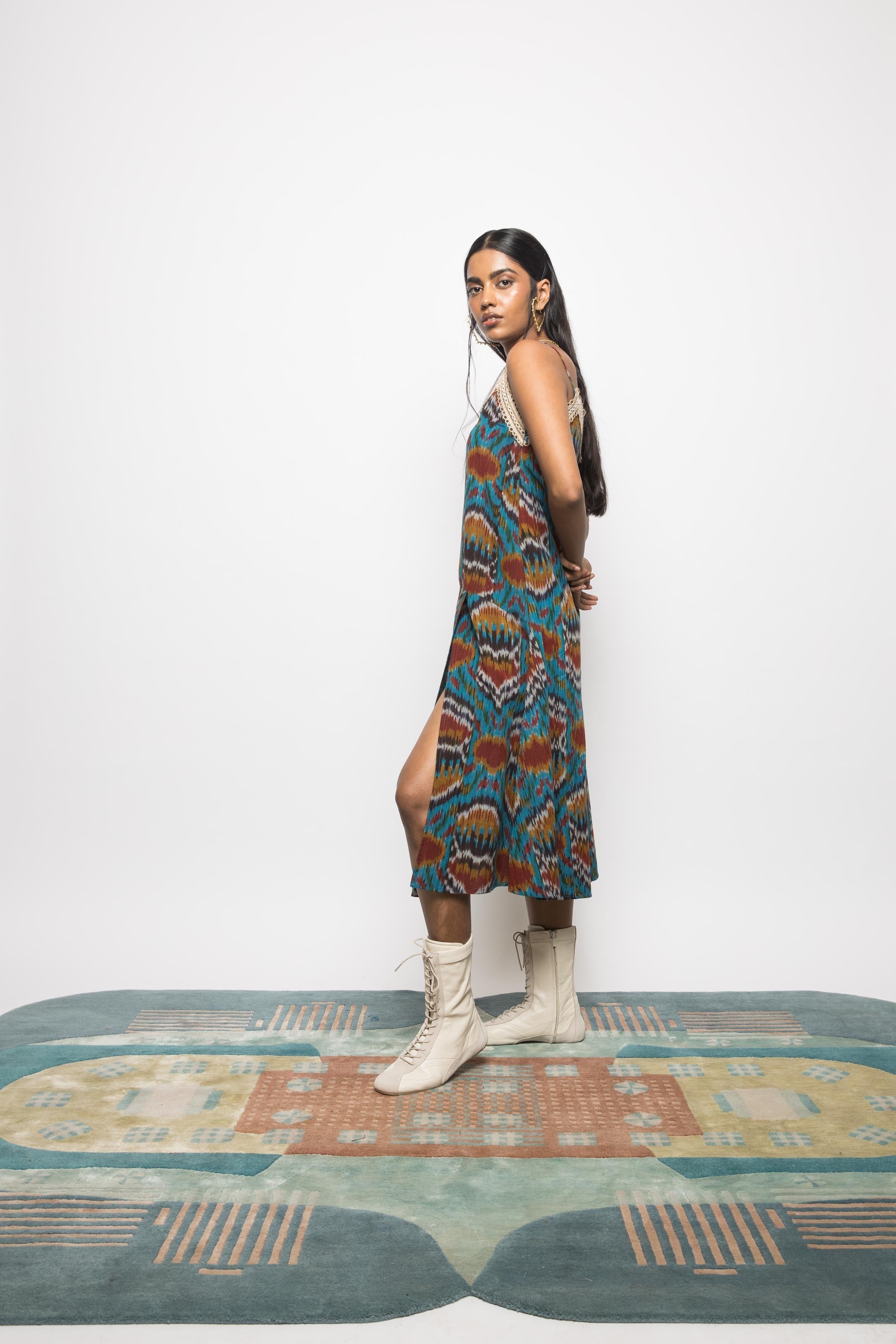 Asymmetric Waist Sling Dress at kamakhyaa.com by Anushé Pirani. This item is 100% Cotton, Beach Wear, Brunch Wear, Casual Wear, Console Collection List, Cotton, Fresh Ink by Anushe Pirani, Handwoven cotton, Ikat Prints, Regular Fit, Resort Wear, Turquoise, Vacation Wear, Womenswear