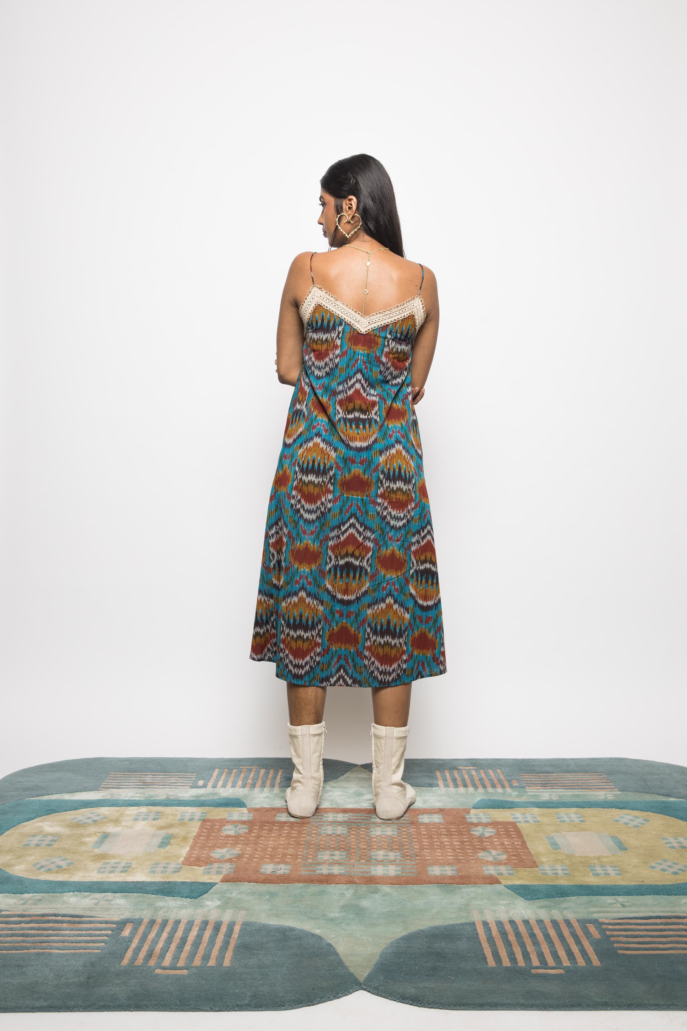 Asymmetric Waist Sling Dress at kamakhyaa.com by Anushé Pirani. This item is 100% Cotton, Beach Wear, Brunch Wear, Casual Wear, Console Collection List, Cotton, Fresh Ink by Anushe Pirani, Handwoven cotton, Ikat Prints, Regular Fit, Resort Wear, Turquoise, Vacation Wear, Womenswear