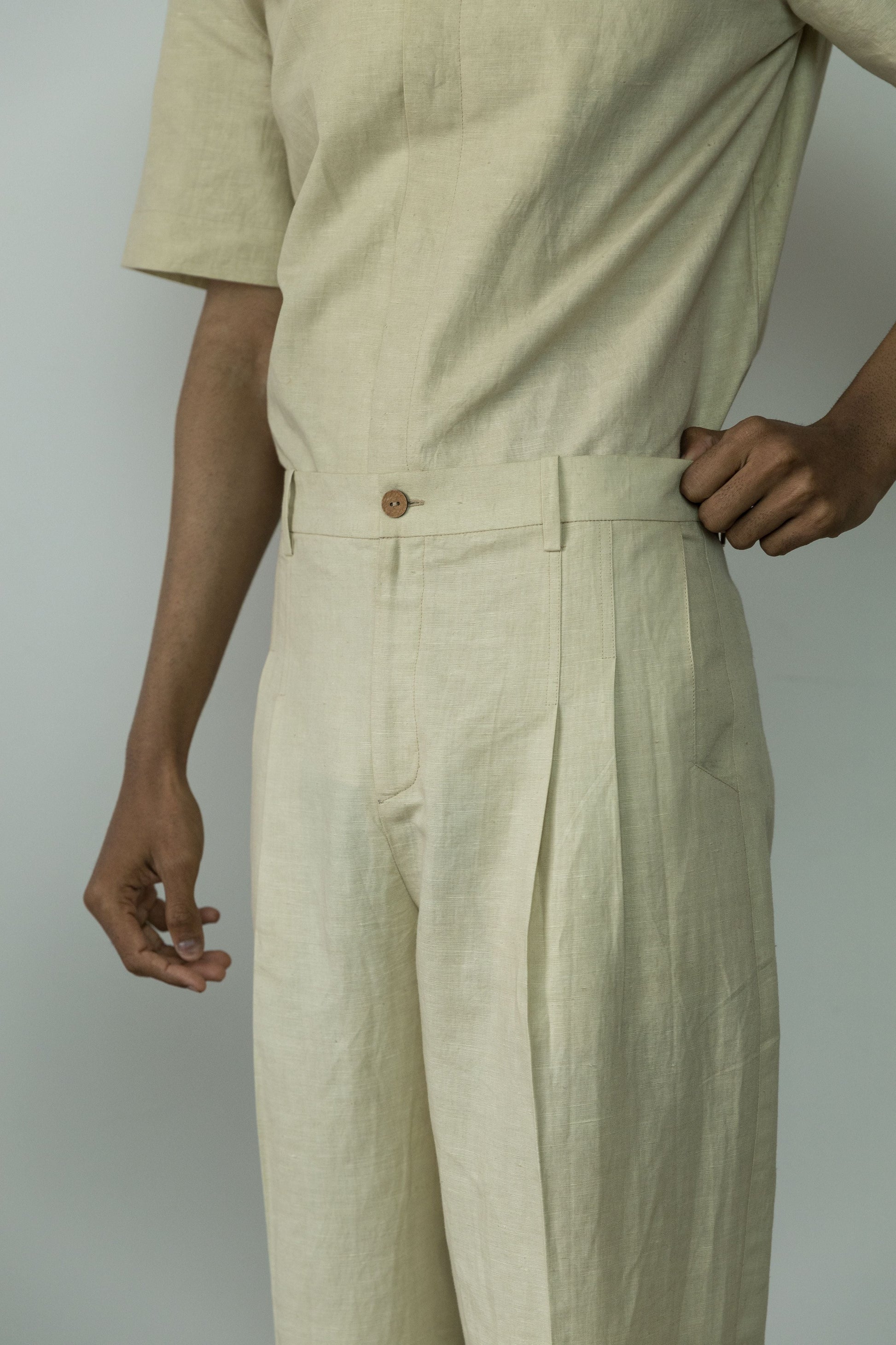 Beige Casual Pants at Kamakhyaa by Anushé Pirani. This item is Beige, Casual Wear, Cotton, Cotton Hemp, For Him, Handwoven, Hemp, Mens Bottom, Menswear, Pants, Relaxed Fit, Shibumi Collection, Solids