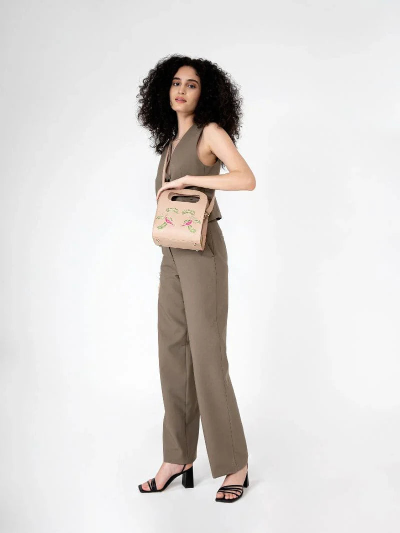 Beige Embroidered Crossbody Bag at Kamakhyaa by Green Hermitage. This item is Apple Leather, Beige, Crossbody Bags, Free Size, Hemp, Lyocell, Party Wear, Recycled, Thread Work Embroidery