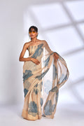 Beige Floral Print Saree with Blouse at Kamakhyaa by Hasttvam. This item is Beige, Festive Wear, Floral, Kota Doria, Natural dyes, Relaxed Fit, Respondible production and Vegan