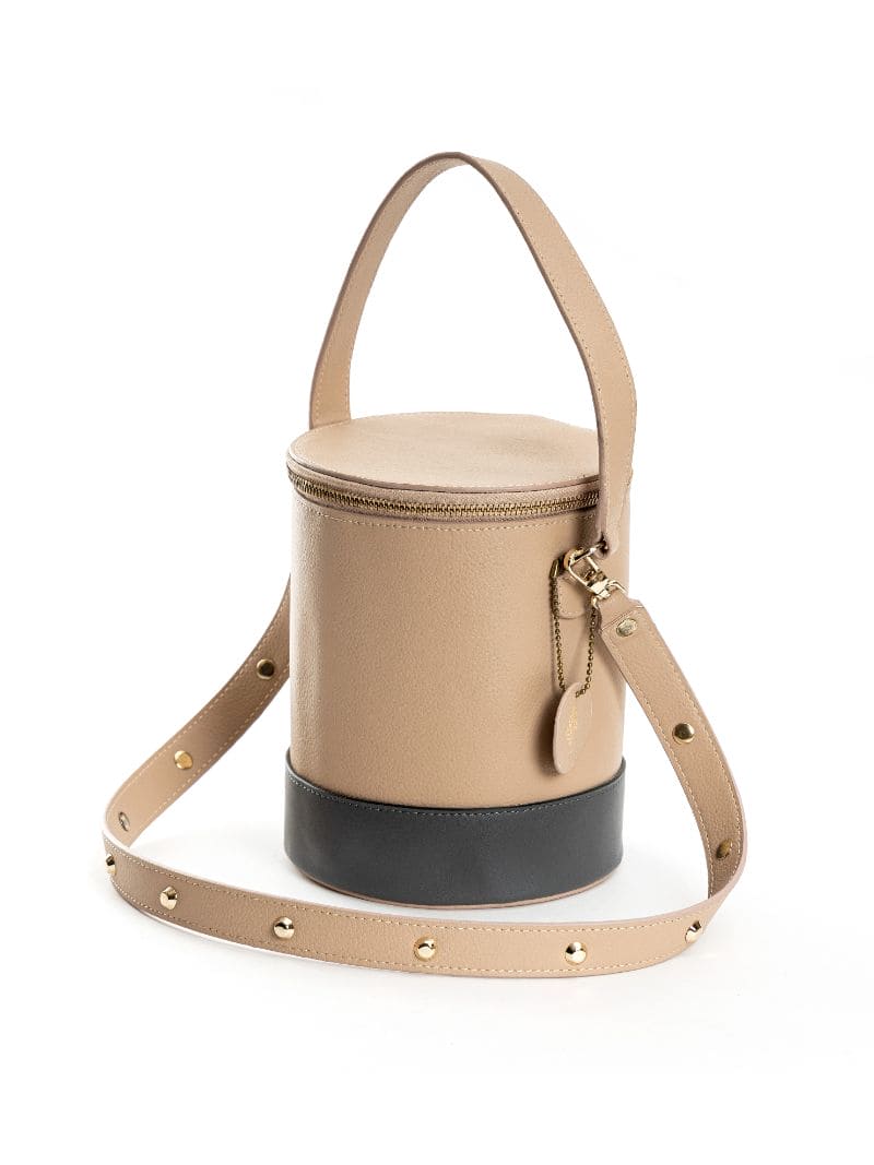 Beige Solid Bucket Bag at Kamakhyaa by Green Hermitage. This item is Apple Leather, Beige, Bucket Bags, Casual Wear, Free Size, Hemp, Lyocell, Recycled, Solids