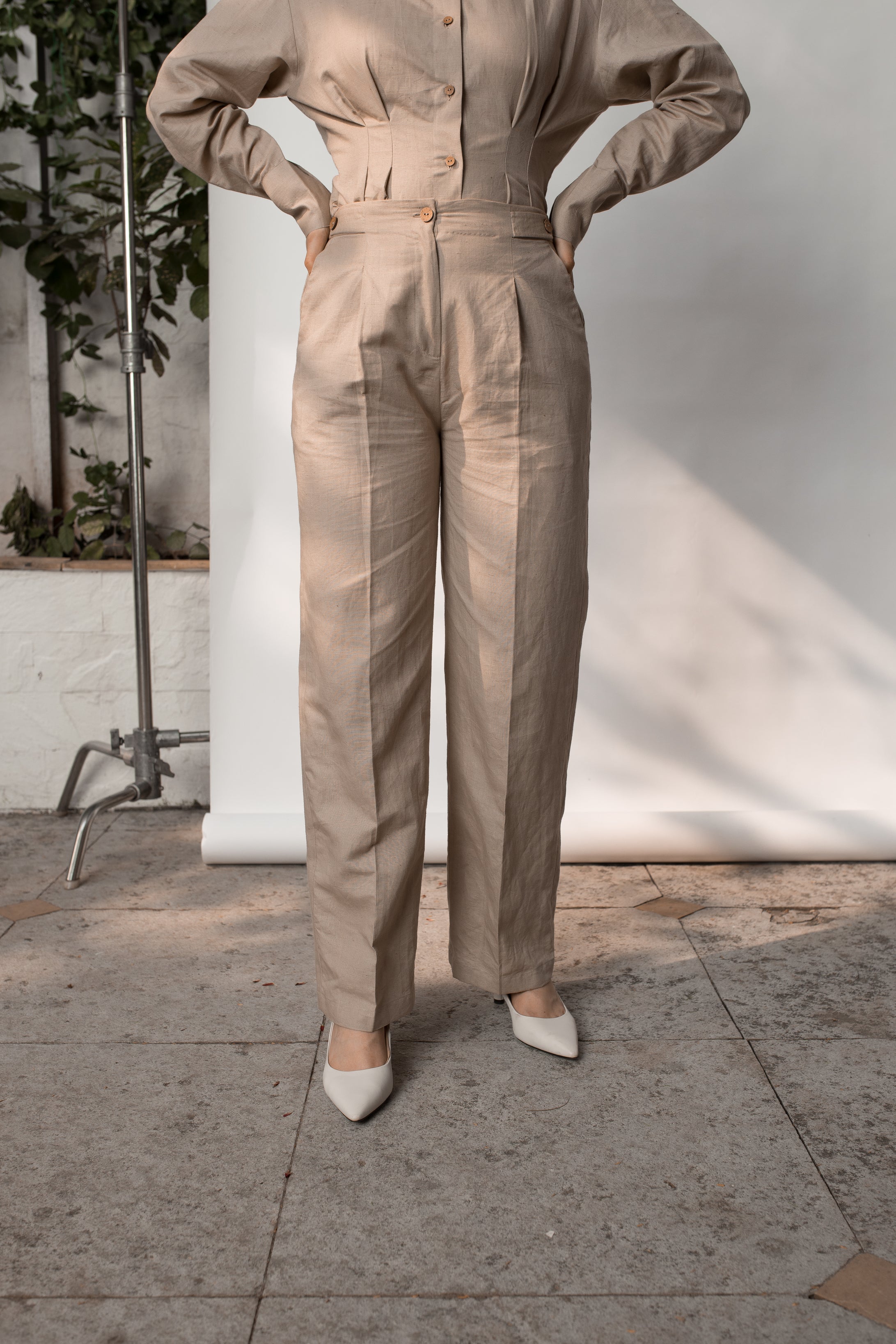 Beige Solid Tailored Pants at kamakhyaa.com by Anushé Pirani. This item is Beige, Console Collection List, Cotton, Hemp, Nostalgic Whispers by Anushe Pirani, Office Formals, Office Wear, Pants, Regular Fit, Review September 2025, Solids, Womenswear