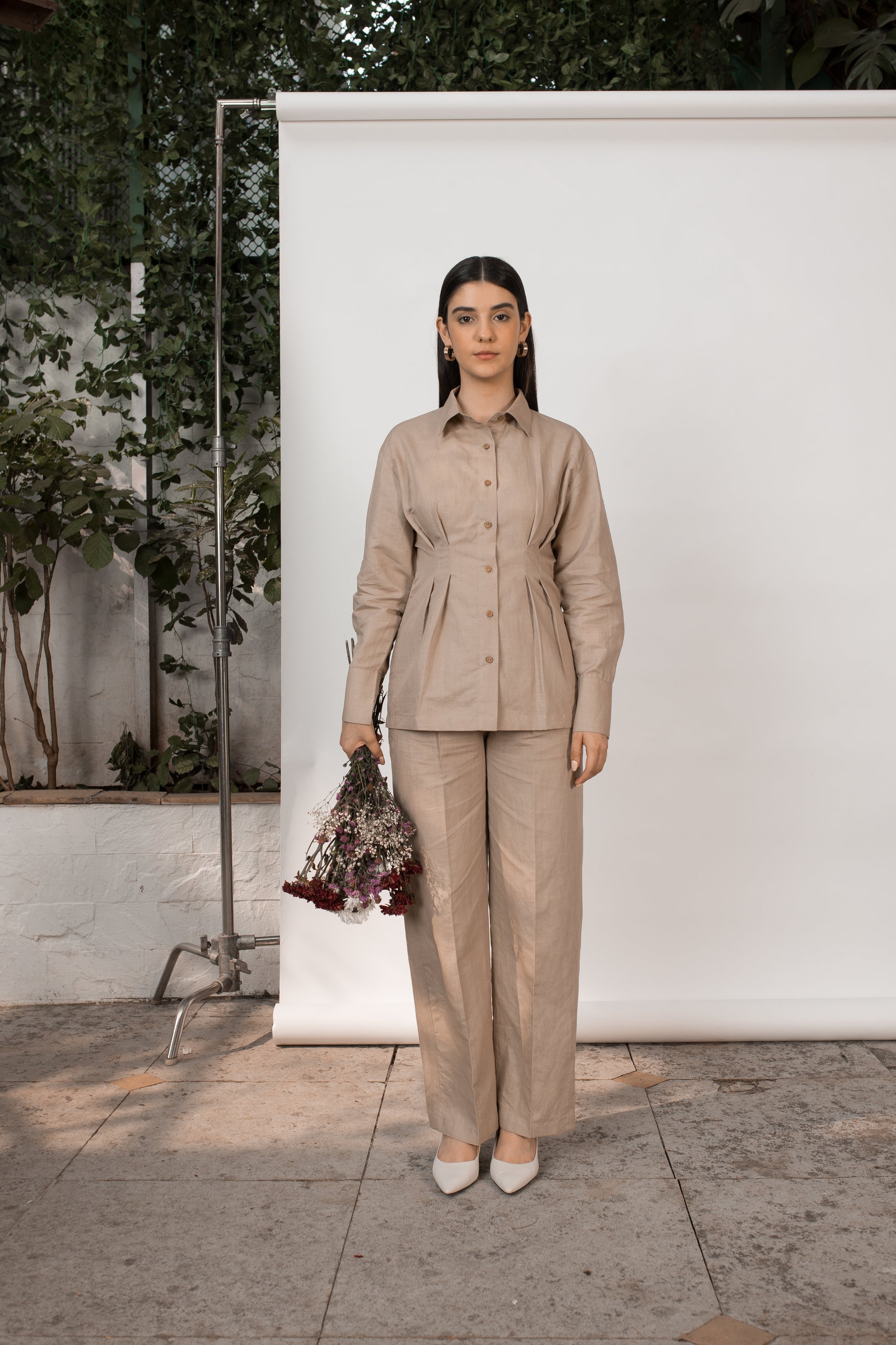 Beige Solid Tailored Pants at kamakhyaa.com by Anushé Pirani. This item is Beige, Console Collection List, Cotton, Hemp, Nostalgic Whispers by Anushe Pirani, Office Formals, Office Wear, Pants, Regular Fit, Review September 2025, Solids, Womenswear