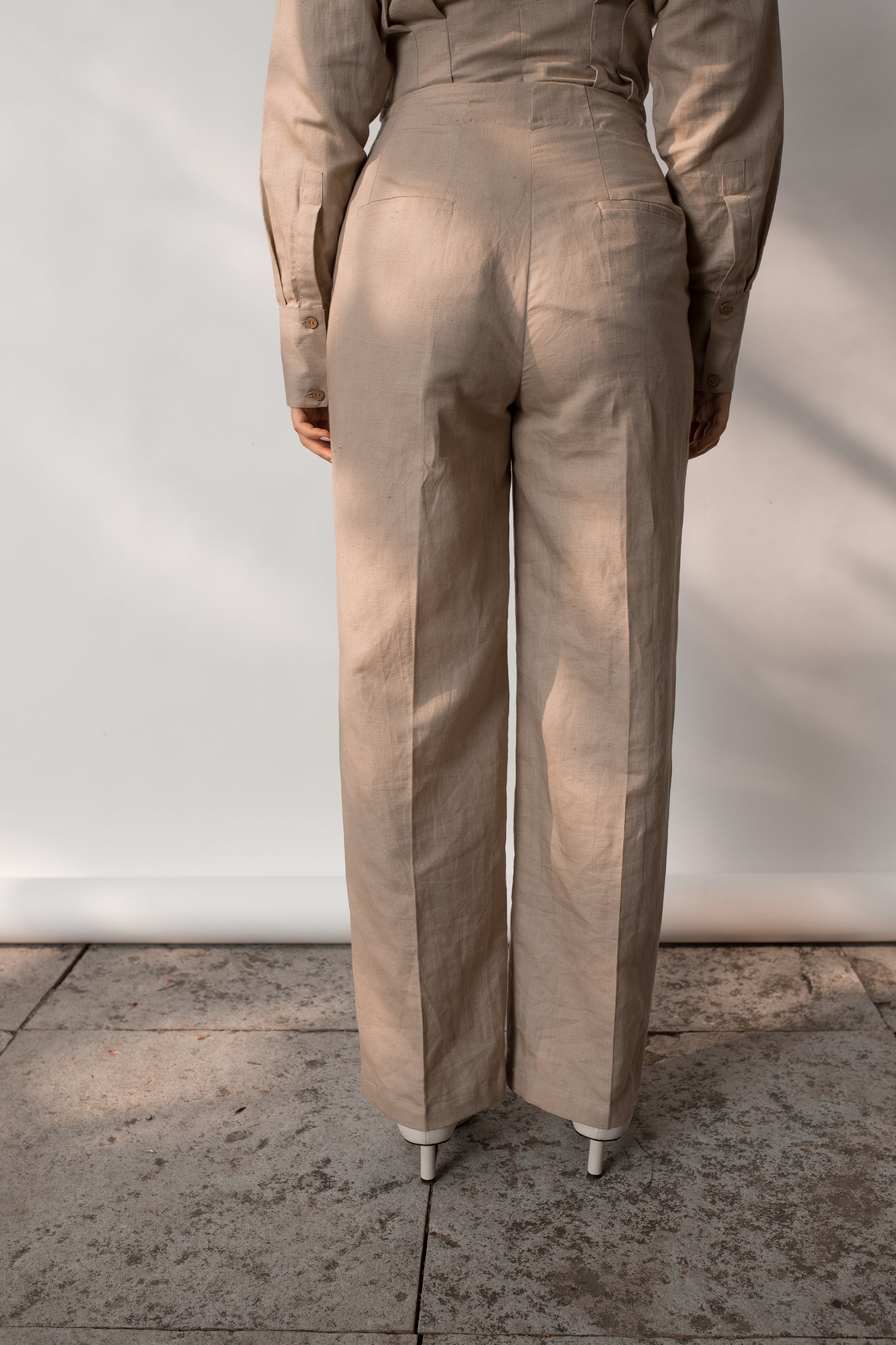 Beige Solid Tailored Pants at kamakhyaa.com by Anushé Pirani. This item is Beige, Console Collection List, Cotton, Hemp, Nostalgic Whispers by Anushe Pirani, Office Formals, Office Wear, Pants, Regular Fit, Review September 2025, Solids, Womenswear