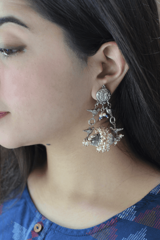 Bird Feeder Earrings at Kamakhyaa by House Of Heer. This item is Festive Jewellery, Festive Wear, Free Size, Handcrafted, jewelry, Jhumkas, July Sale, July Sale 2023, Long Earrings, Mix metal, Multicolor, Natural, Pearl, Silver, Solids, Textured