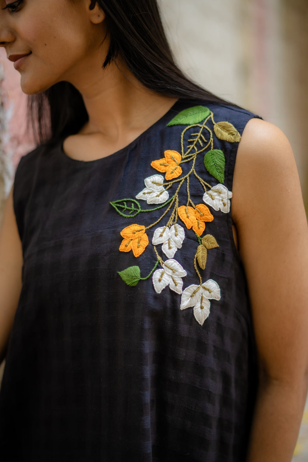 Black A-line Dress with Floral Hand-Embroidery at Kamakhyaa by Krushnachuda. This item is Black, Chilika by Krushnachuda, Embroidered, Handloom Cotton, Loose Fit, Natural Dye, Organic, Outerwear, Under $200, Womenswear