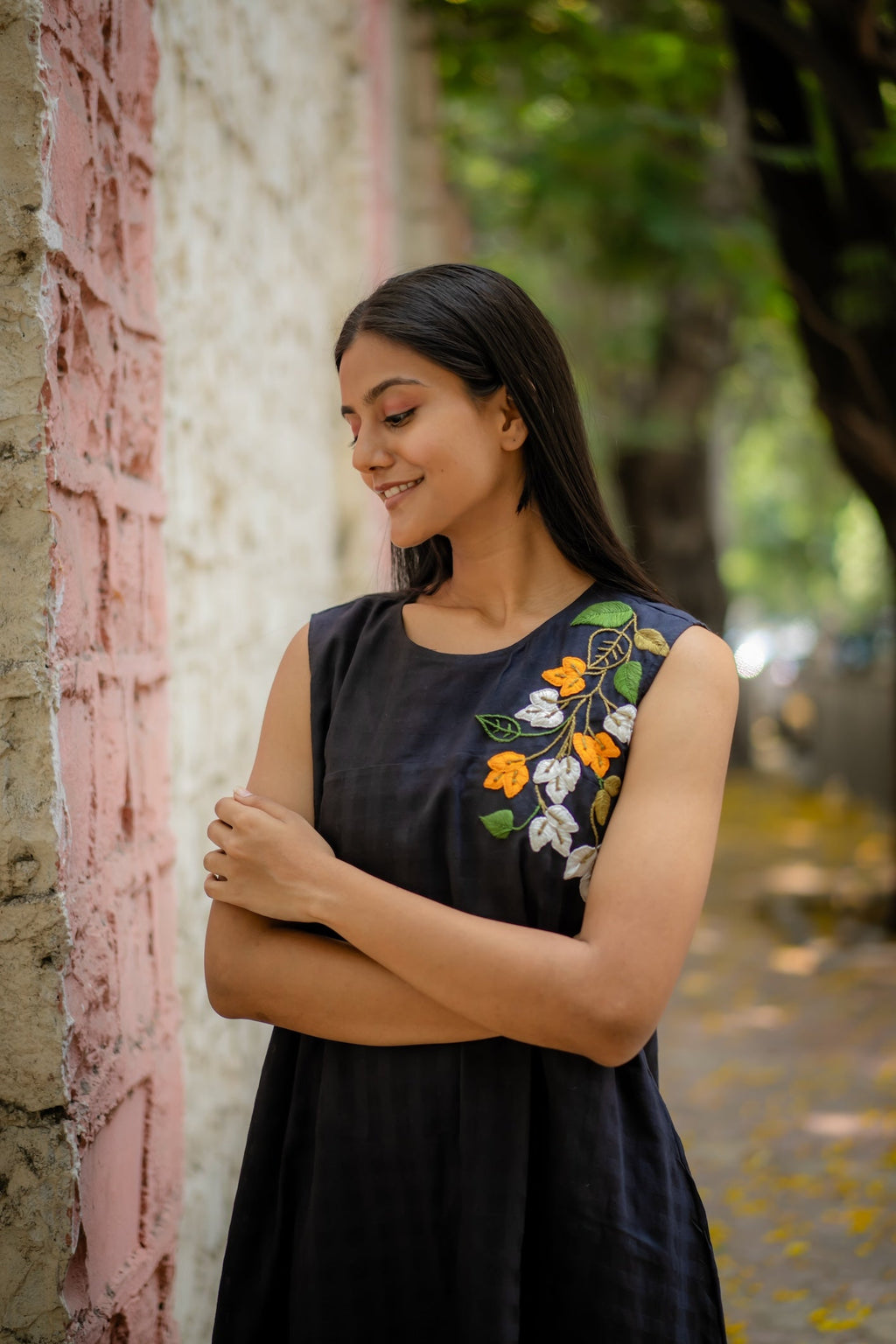 Black A-line Dress with Floral Hand-Embroidery at Kamakhyaa by Krushnachuda. This item is Black, Chilika by Krushnachuda, Embroidered, Handloom Cotton, Loose Fit, Natural Dye, Organic, Outerwear, Under $200, Womenswear