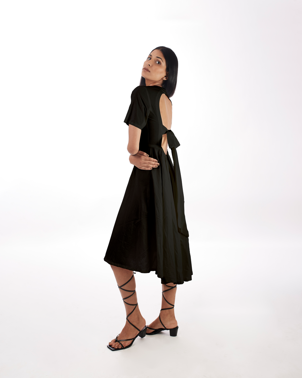 Black Backless Midi Dress at Kamakhyaa by Kamakhyaa. This item is 100% pure cotton, Black, Casual Wear, Evening Wear, FB ADS JUNE, Fitted At Waist, KKYSS, Midi Dresses, Natural, Relaxed Fit, Solids, Summer Sutra, Womenswear