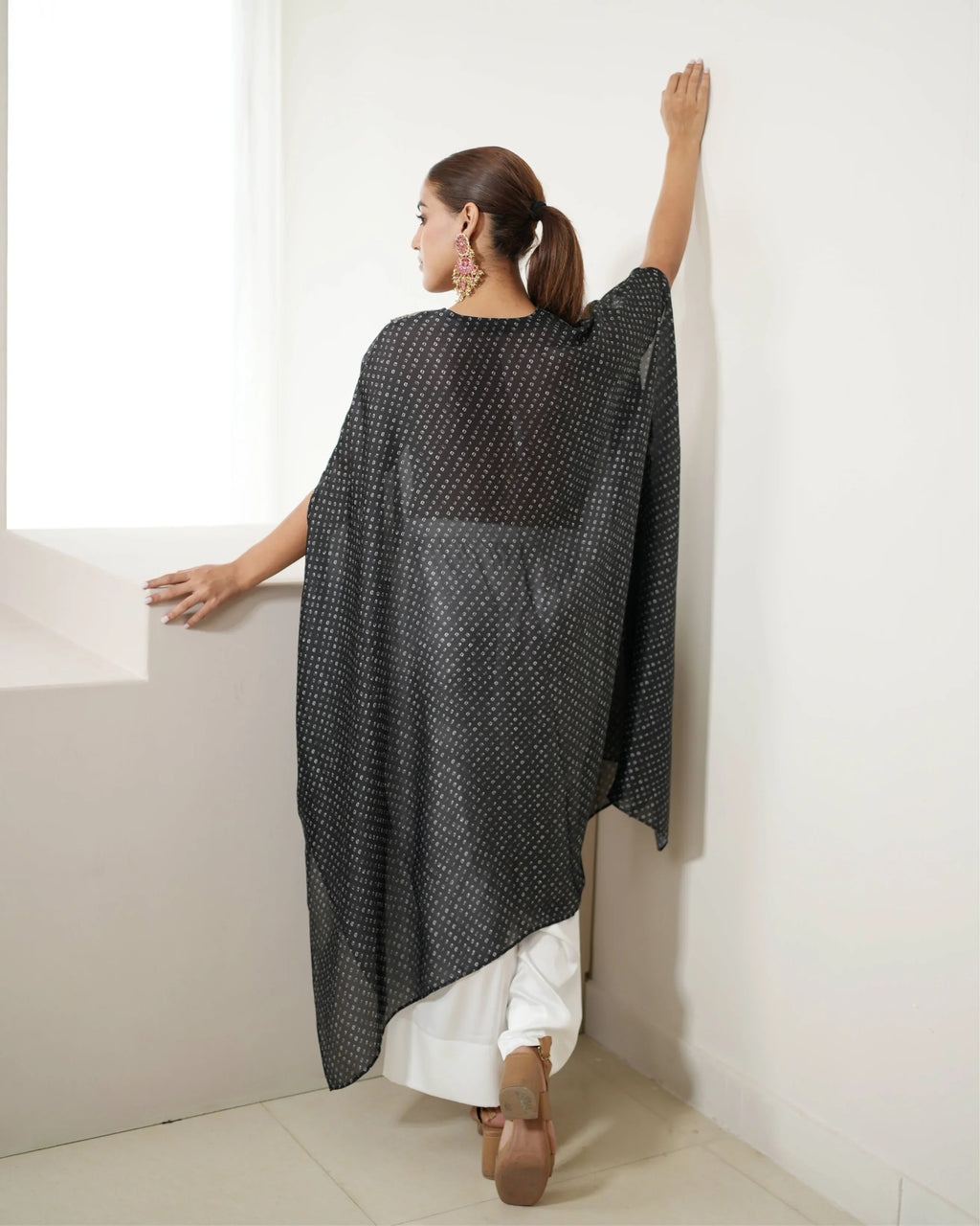 Black Beautiful V-neck Kurta Pant Set at Kamakhyaa by Mayura Kumar. This item is Bandhej, Bandhej Bandhini Mixology by Mayura Kumar, Black, Dry clean, Festive Wear, Relaxed Fit, Satin Silk, Tie & Dye