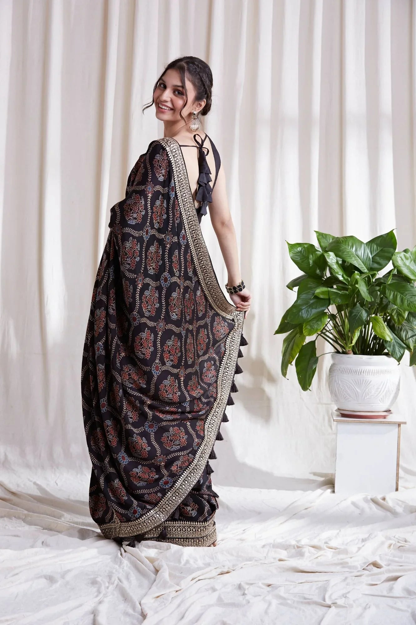 Black Hand Block Printed Saree at Kamakhyaa by Hasttvam. This item is Black, Festive Wear, Floral, Handmade by Artisans, Modal silk, Natural dyes, Relaxed Fit, Respondible production and Vegan