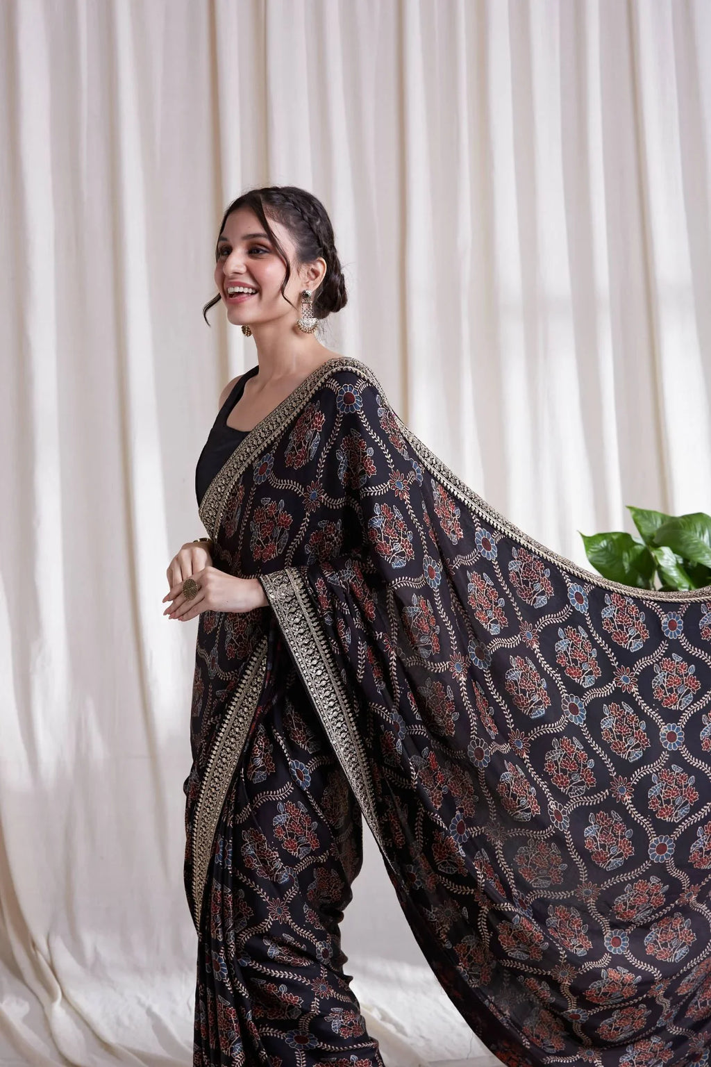 Black Hand Block Printed Saree at Kamakhyaa by Hasttvam. This item is Black, Festive Wear, Floral, Handmade by Artisans, Modal silk, Natural dyes, Relaxed Fit, Respondible production and Vegan