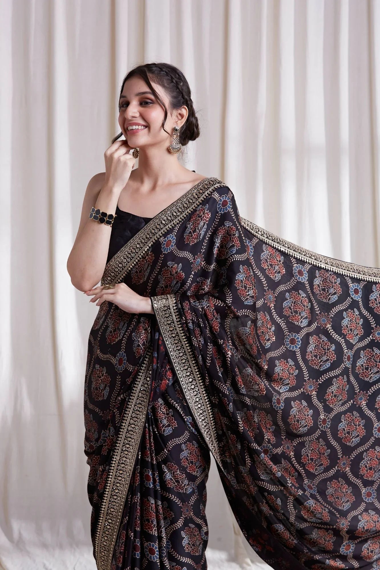 Black Hand Block Printed Saree at Kamakhyaa by Hasttvam. This item is Black, Festive Wear, Floral, Handmade by Artisans, Modal silk, Natural dyes, Relaxed Fit, Respondible production and Vegan