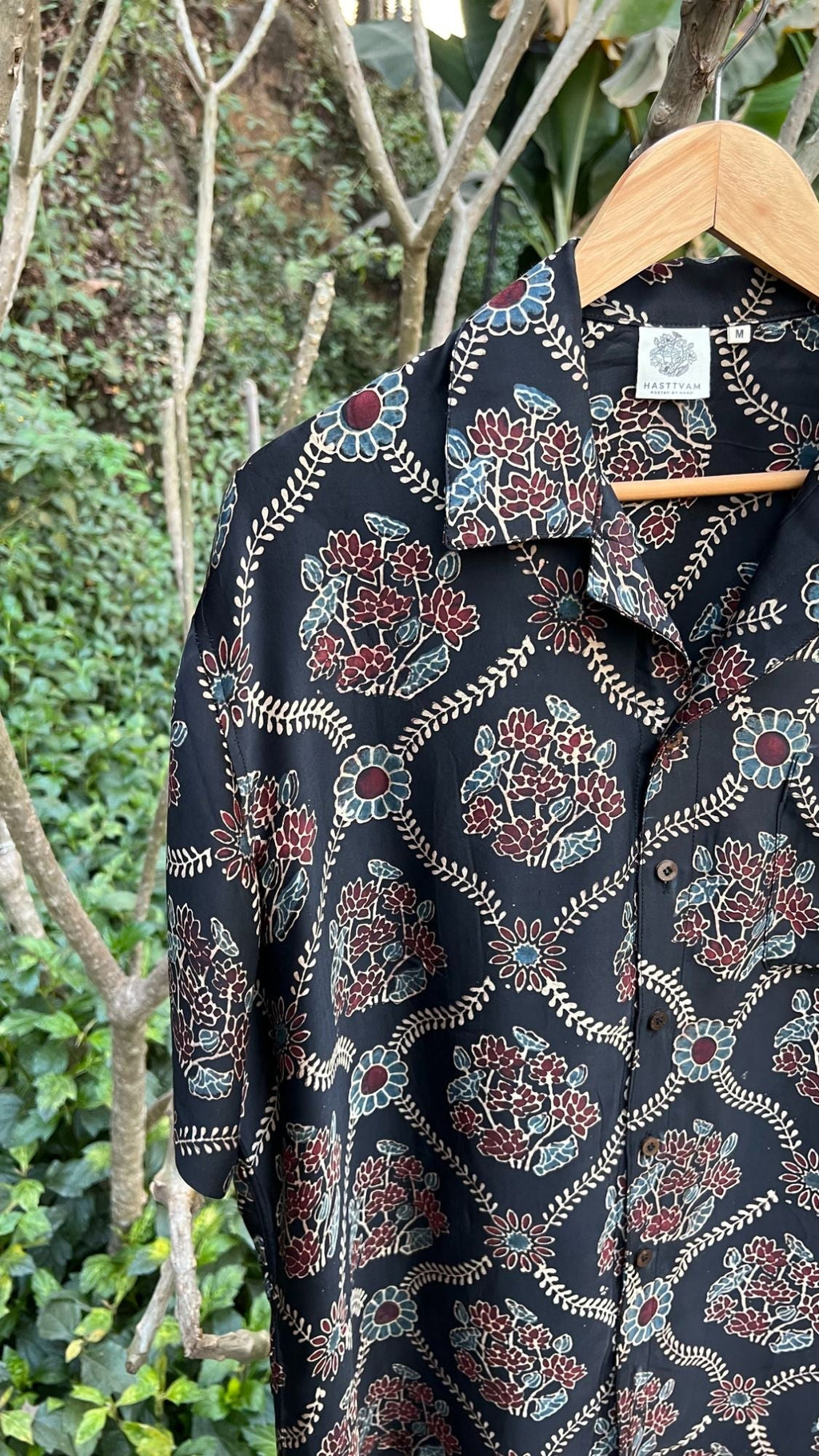 Black Hand Block Printed Shirt at Kamakhyaa by Hasttvam. This item is Black, Casual Wear, Floral, Handmade by Artisans, Modal silk, Natural dyes, Relaxed Fit, Respondible production and Vegan
