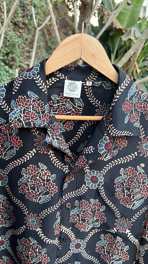 Black Hand Block Printed Shirt at Kamakhyaa by Hasttvam. This item is Black, Casual Wear, Floral, Handmade by Artisans, Modal silk, Natural dyes, Relaxed Fit, Respondible production and Vegan