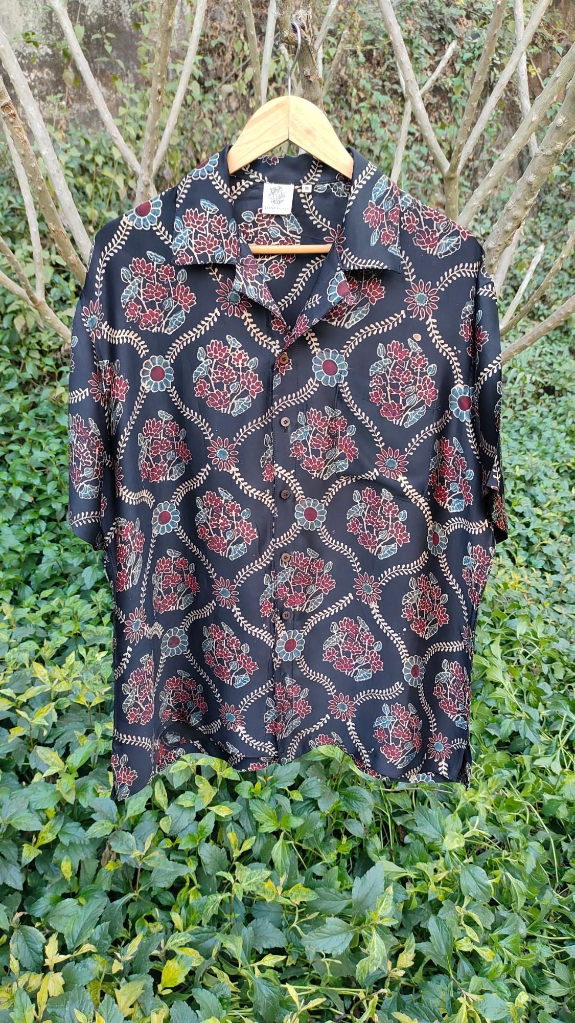 Black Hand Block Printed Shirt at Kamakhyaa by Hasttvam. This item is Black, Casual Wear, Floral, Handmade by Artisans, Modal silk, Natural dyes, Relaxed Fit, Respondible production and Vegan