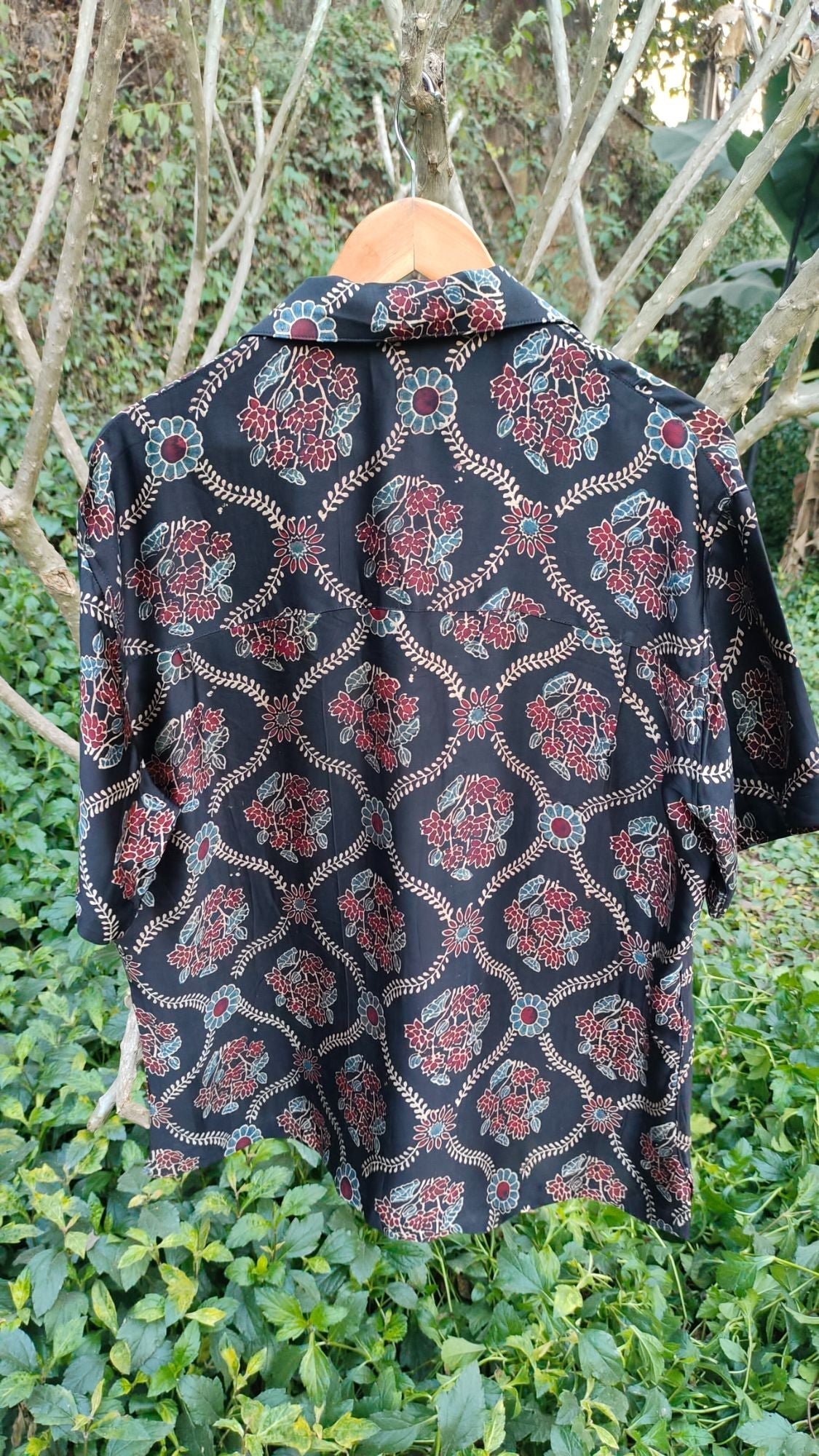 Black Hand Block Printed Shirt at Kamakhyaa by Hasttvam. This item is Black, Casual Wear, Floral, Handmade by Artisans, Modal silk, Natural dyes, Relaxed Fit, Respondible production and Vegan