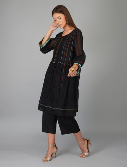 Black Hand Embroidered Chanderi Co-ord Set at Kamakhyaa by Devyani Mehrotra. This item is Black, Chanderi Silk, Co-ord Sets, Cotton, Embroidered, Evening Wear, Natural, Pre Spring 2023, Regular Fit, Solids, Travel Co-ords, Womenswear