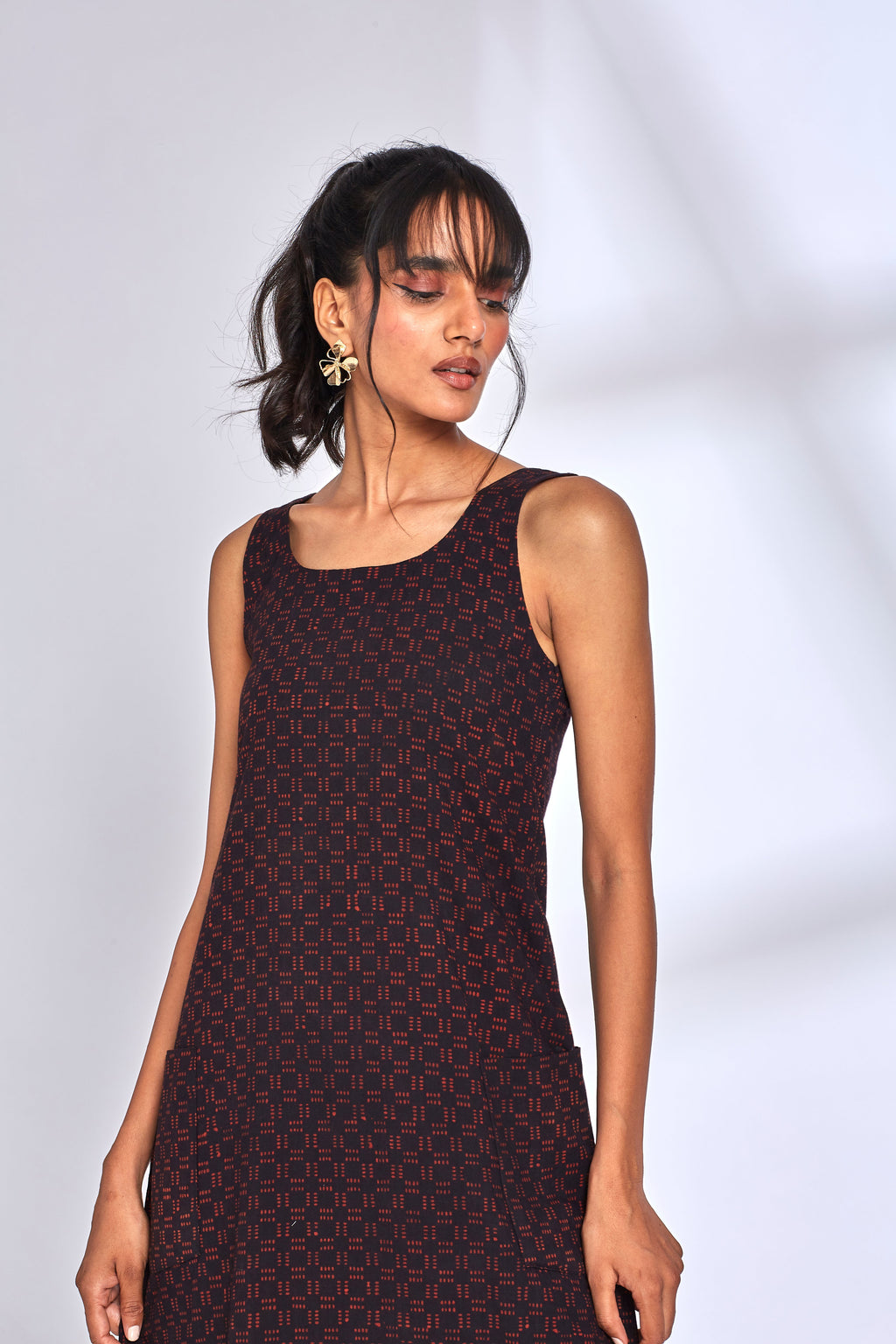 Black Midi Dress with side slit at Kamakhyaa by Hasttvam. This item is Black, Cotton, Fusion Wear, Natural dyes, Printed, Relaxed Fit, Respondible production and Vegan, Solids
